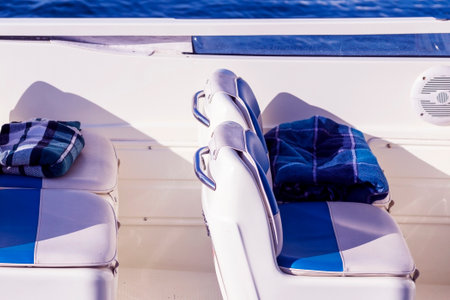 The walking boat with seats. Convenient chairs on the yacht. driving by sea. Inside of the boat