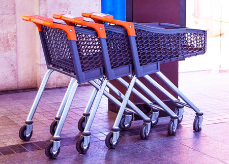 Trolley in the store. carts. Concept buyers, customer, purchaser, shopper, bidder, acquirer