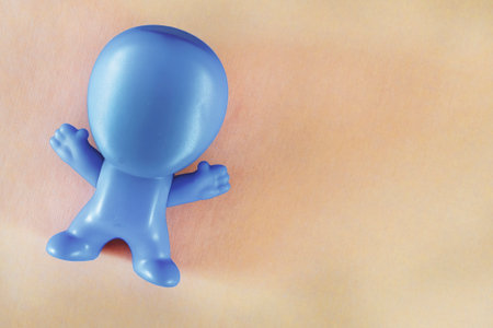 human figure on the background. little man, man, person, human, individual, human being, fellow on a yellow background. copy spaceの写真素材