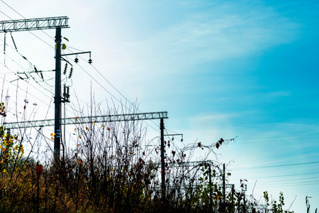 pole with wires. wires cables on Electric poles.A fiber optic cable harness on a concrete column. Telecommunications and Internet. Tangled electric cablesの写真素材