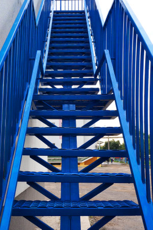staircase. The concept of a career ladder to clamber up. start date, next stage, career ladder, the beginning of the way. Bright future concept. step up the stairsの写真素材