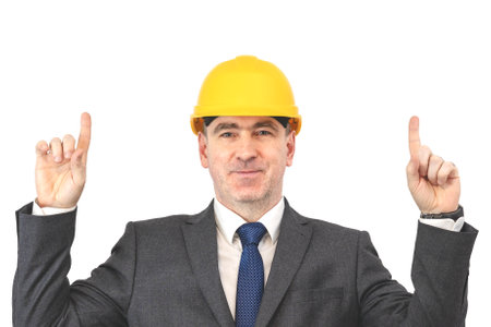 A man in a helmet shows his hands up. A builder man in a suit points up with his fingers over...