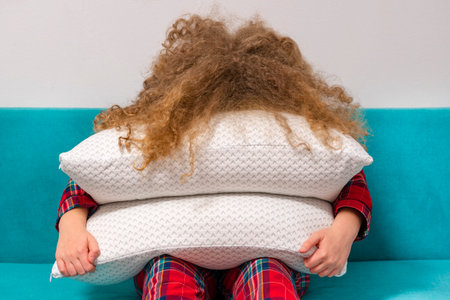 girl sleeping beautiful girl sleeps. Concept of a good, sound sleep. face in the pillows