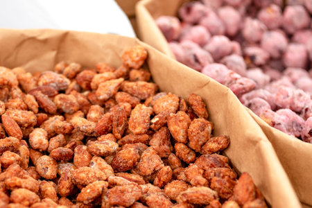Roasted peanuts in icing sugar. Peanut in powdered sugar. groundnut, goober, monkeynut, earth-nut
