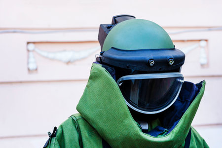Armor costume consisting of a steel helmet. The concept of demining of city objects. Prevention of threat of explosions and life of people.の写真素材