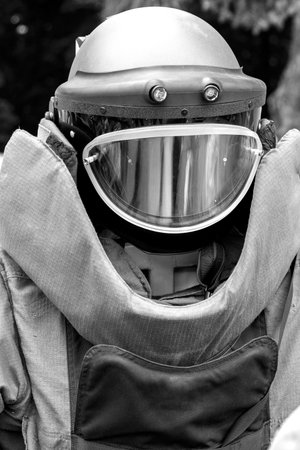 Armor costume consisting of a steel helmet. The concept of demining of city objects. Prevention of...