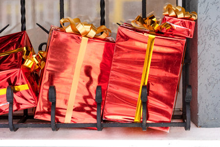 Christmas presents. red gift box. Red gift boxes sprinkled with snow. Holidays conceptの写真素材