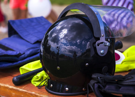 Police protective clothes. A helmet, armor - a bulletproof vest, a transparent protective shield, board. body armorの写真素材