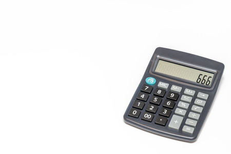Office or home calculator isolated on white with devils numbers 666の写真素材