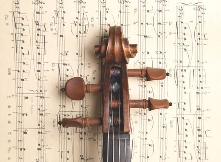 Vintage violin on the  sheet music.の写真素材