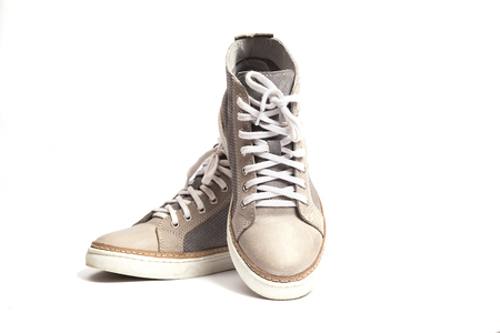 new gray sneakers isolated on white background.の写真素材