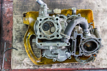 Part of a motorcycle engine in repair of the damage,Garage shopの写真素材