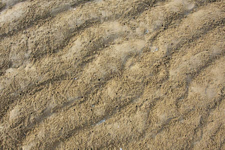 Sand, water lines in Thailand