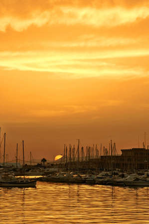 Sunset in port of Santa Pola, Alicanteの写真素材