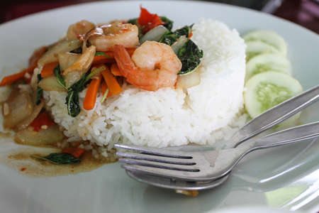 Shrimp basil stir fried on riceの写真素材