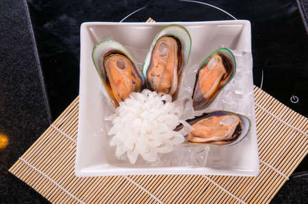 New Zealand mussels with a black backgroundの写真素材