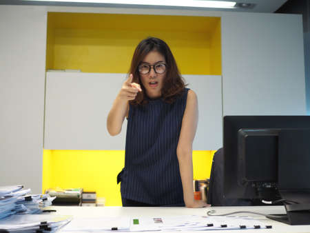Angry woman boss yellingの写真素材