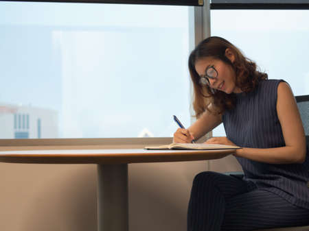 Smart working woman in the officeの写真素材