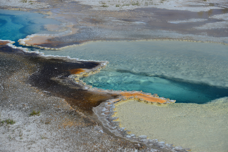 Hot geyser pool in Old Faithful area of Yellowstone National Parkの写真素材