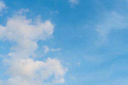White clouds floating on blue skyの写真素材