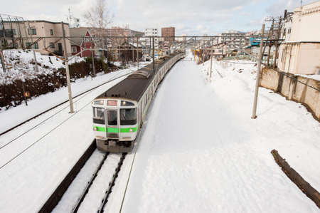 train on snowy platformのeditorial素材