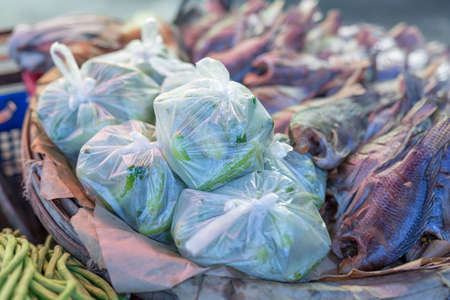 Cucumber in bag at marketの写真素材