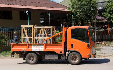 PHITSANULOK, THAILAND - NOVEMBER 14 , 2016 :  Mini truck  moving the transformer in Phitsanulok,...