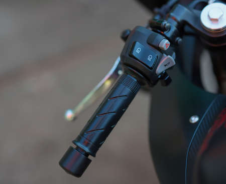 Light switch on a motorcycle handlebarの写真素材