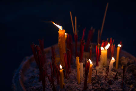 burning candle and burning incense.の写真素材