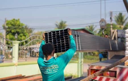 PHITSANULOK, THAILAND - FEBRUARY 19, 2017: construction worker on construction site with cranes lifting steel in Phitsanulok, Thailandのeditorial素材