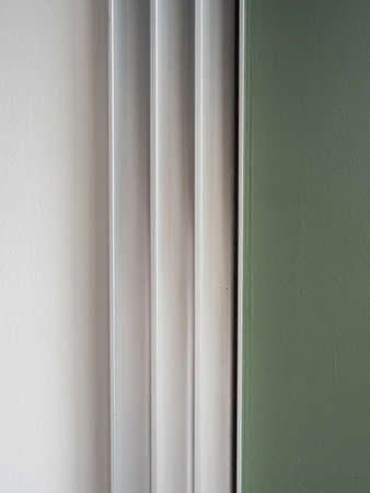 Jamb framing background with the difference wall color green and whiteの写真素材