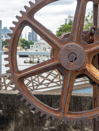 Rusty and metallic gear wheel, part of old boat winchの写真素材