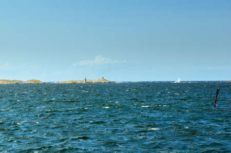 Blowing on the swedish west coast on a blue skyの写真素材