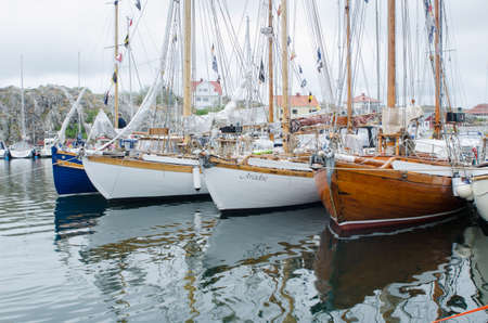 many boat made of wood in the harbour its a festival in swedenのeditorial素材