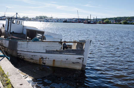 one ship wreck in the harbour in gothenburg swedenの写真素材