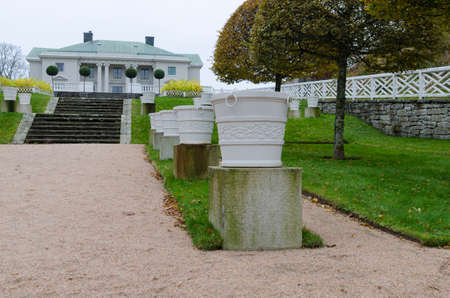 Gunnebo castle in molndal with beutiful garden pots and the stair up to the castleのeditorial素材