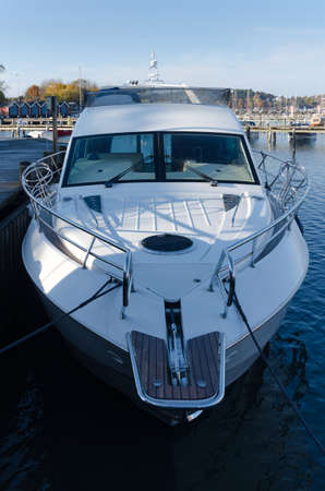 one big motorboat Yacht in the marina waiting to come up on landの写真素材