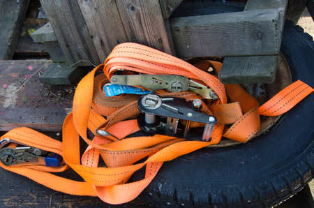 some orange straps to security the load on the carのeditorial素材