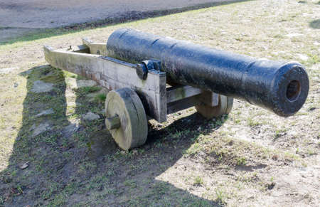 one old cannon of metall and wood build to defence gothenburgの写真素材