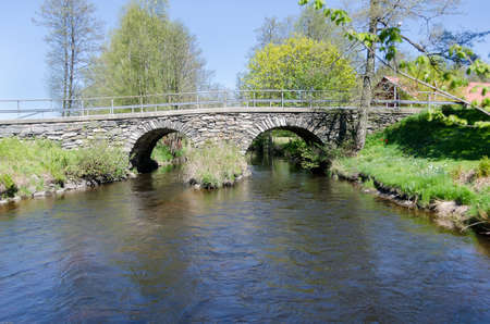 old stonebridge over the cold water one sunny day in early spring