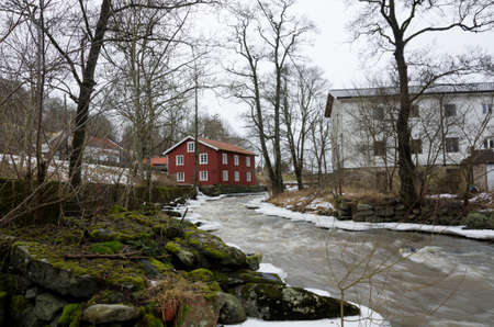 Kungsbacka river with  cold water one grey day in early springの写真素材
