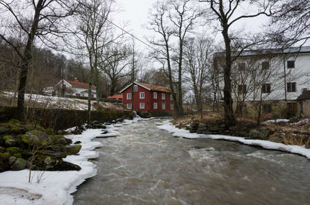 Kungsbacka river with  cold water one grey day in early springの写真素材