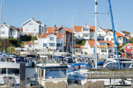 one small place on swedish westcoast many boat and restarangのeditorial素材