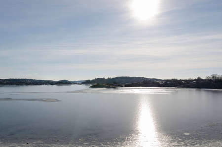 the sun is shining over the water on the swedish westcoastの写真素材