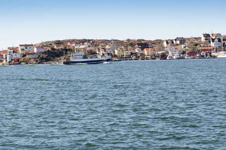 one big fishing boat going out from the harbour to fish