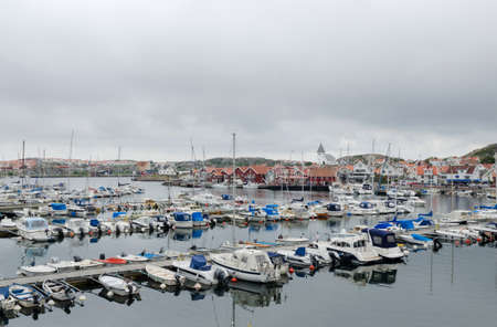 one small place on swedish westcoast many boat and restarangのeditorial素材