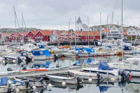 one small place on swedish westcoast many boat and restarangの写真素材