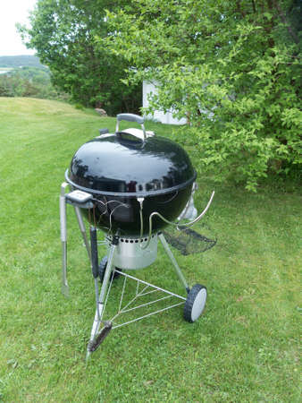 one barbeque grill in the garden ready to make the foodの写真素材