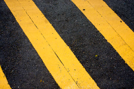 Asphaltic concrete road background and traffic sign pattern