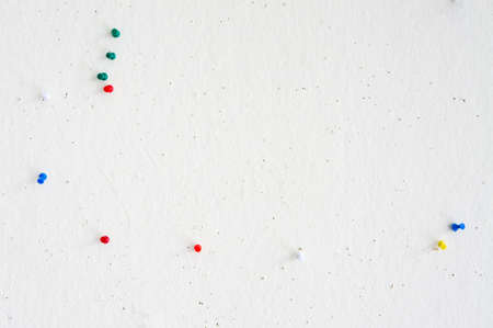 old White board with various color of pins.の写真素材